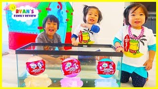 Ryan Emma and Kate Open Surprise Toys in the fish Tank and Learn Colors [upl. by Naoma73]