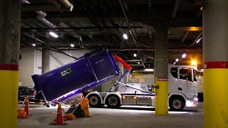 POV HOOK LOADER  PICKING UP A COMPACTOR IN A UNDERGROUND GARAGE [upl. by Llerred552]