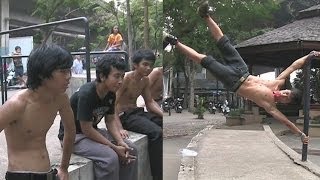 06 Shirtless boys practice Parkour at Sathorn Park  Bangkok Thailand Clip [upl. by Nwahser454]