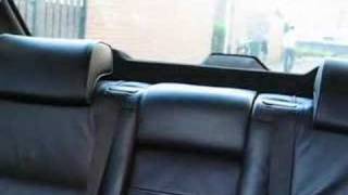 E38 BMW 740i Automatic folding headrests rear [upl. by Trefor]