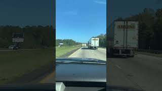 CRAZY DRVERS quotOVERLOADquot TRAILER TRUCK Passes SemiTruck on South Carolina Hwy at 70 miles an hour [upl. by Ielak]