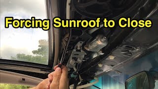 How to manually force a broken sunroof to close [upl. by Yllaw]