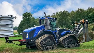 New Holland T9700 SmartTrax and Crary tile plow in Michigan spring of 2022 [upl. by Ahselef]