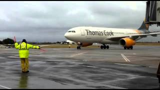 Marshaling Thomas Cook A330 into Gate 1  VC Bird Intl Airport [upl. by Nomelihp]