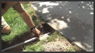 How to install a sprinkler pipeconduit under a sidewalk [upl. by Cod]