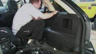 Installing an Amplifier amp Subwoofer Geek Squad Autotechs [upl. by Hinckley635]