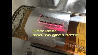 How to engraving on glass bottle with a fiber laser [upl. by Muriah483]