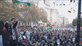 ProPalestinian supporters march through London [upl. by Yelbmik359]