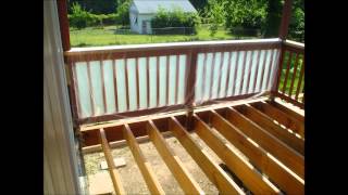 Applying Cabot Australian Oil Natural to the deck joists and beams [upl. by Cam]