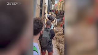 Volunteers Sing Valencias Anthem as They Clean After Devastating Flood [upl. by Breech]