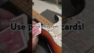 Use playing cards to measure guitar string height [upl. by Aneg]