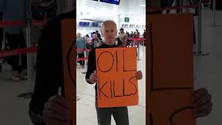 Lone ecoprotester arrested at Glasgow airport [upl. by La Verne]