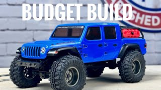 SCX24 BUDGET BUILD – Building a BEAST for 100 Upgrades Installation Free Mods amp More [upl. by Coltun970]