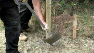 How to install a fence post into soil [upl. by Talmud]