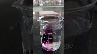 Diffusion of potassium permanganate crystals in water  Chemistrydemo [upl. by Laurel451]