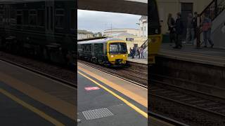 GWR class 166 pulls in at Dawlish Station with the Paignton to Exmouth service 166211 DMU [upl. by Eilahtan594]