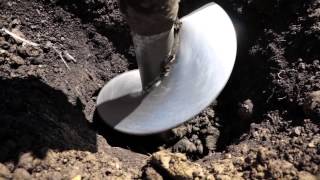 Digging Post Hole Through Rocks [upl. by Ahtiek]