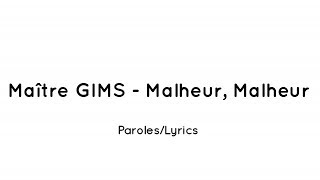 MAÎTRE GIMS  Malheur Malheur ParolesLyrics [upl. by Ayrotal]