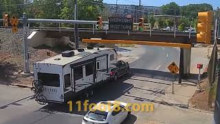 Camper trailer loses equipment at the 11foot88 bridge [upl. by Noirod]