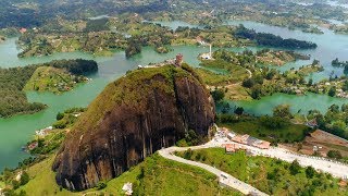 CLIMBING A GIANT ROCK IN GUATAPÉ COLOMBIA EL PEÑOL TRAVEL VLOG  Eileen Aldis [upl. by Coyle150]