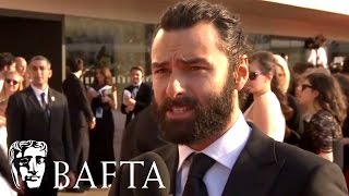 Aidan Turner Red Carpet Interview  BAFTA TV Awards 2016 [upl. by Ettennil]