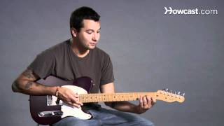 How to Play an F Minor Barre Chord  Guitar Lessons [upl. by Akirdnuhs]