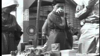 US soldiers and Japanese civilians in Tokyo Japan during American occupation afHD Stock Footage [upl. by Gerstein]