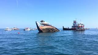 Ship and Tugboat sinking in ocean off of Daytona Beach [upl. by Halilahk]