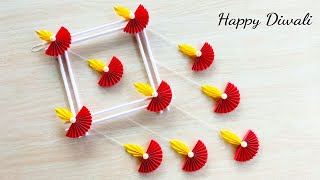 Beautiful Diwali Wall Hanging Craft  Diwali Decoration ideas  Paper Diya making [upl. by Bork]