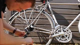 How to Get a Chain Back on the Derailleur of a Bike [upl. by Campball]