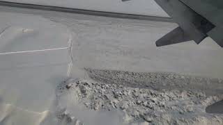 Winter Flight over Icy Alaska and plane landing at Anchorage Airport [upl. by Finella]