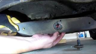 Husqvarna YTH22V46 Blade Change  change your yard tractor blade [upl. by Doowrehs]