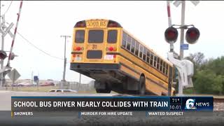 School bus driver nearly collides with train [upl. by Htbazile]