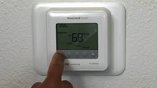 How to Use Your Honeywell T4 Pro Thermostat [upl. by Ettedanreb]