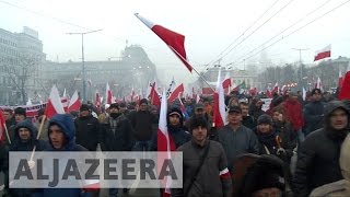 Poland Antiimmigration protests sweep through Warsaw [upl. by Ytissahc]