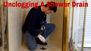 Unclogging A Shower Drain [upl. by Edyth694]