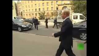 President Vladimir Putin walks alone in the streets of St Petersburg in the Russian [upl. by Iene]