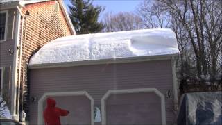 Removing Snow from Roof with Rope [upl. by Joye]