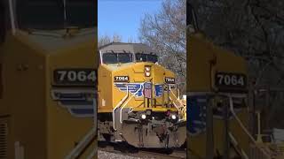 Union Pacific Intermodal train flies past the maintenance work with lots of power at the lead [upl. by Ativahs]