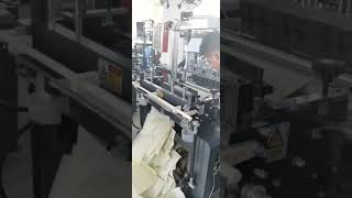 Non woven drawstring bag making machine [upl. by Tirrej]