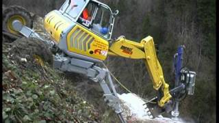 Menzi Muck A91 beim Bohren im Steilhang  Drilling on steep slope [upl. by Duquette]