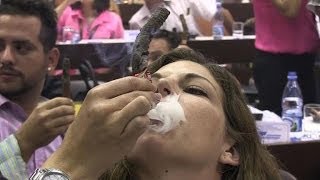 Cigar lovers compete for longest ash prize in Cuba [upl. by Liggitt732]