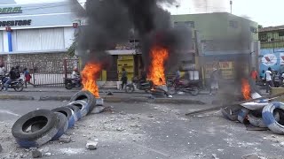 Police fire tear gas as hundreds protest in Haiti  REUTERS [upl. by Donadee896]