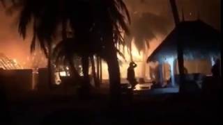 Maldivian resort ON FIRE  Giant inferno devours luxury rusticchic Maldivian resort  WARNING [upl. by Asena]