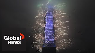 New Years 2023 Taiwan shoots fireworks off Taipei 101 skyscraper [upl. by Aicemat]