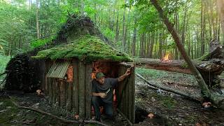 A cozy log cabin for survival under an upturned root Bushcraft Dugout Catch and Cook [upl. by Sally]