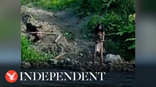 Video shows uncontacted tribe near Indonesias nickel mine [upl. by Ozen]