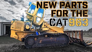 Replacing Sprockets and Arm Rests on a 1991 CAT 963A Track Loader [upl. by Garvy]