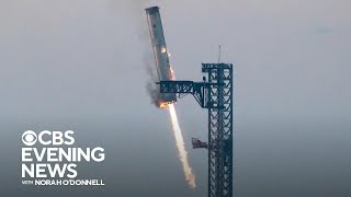 SpaceX catches rocket booster in dramatic landing [upl. by Ahsataj]