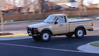 1984 NissanDatsun 720 4x4 Pick up test drive on bring a trailer [upl. by Neemsaj]